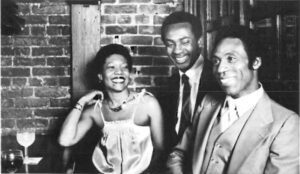 Jewel Restaurant co-owner Jewel Willis chatting with patrons.