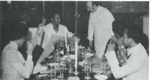 Chef Jim Wilcoxen chatting with guests.Poletti's Restaurant