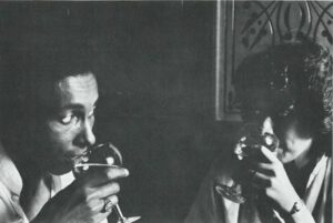 Entertaining with Wine -- A couple sipping glasses of wine .