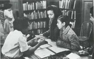 Kids: Plant That Learning Tree In Your Home — Mother and Daughter with Librarian