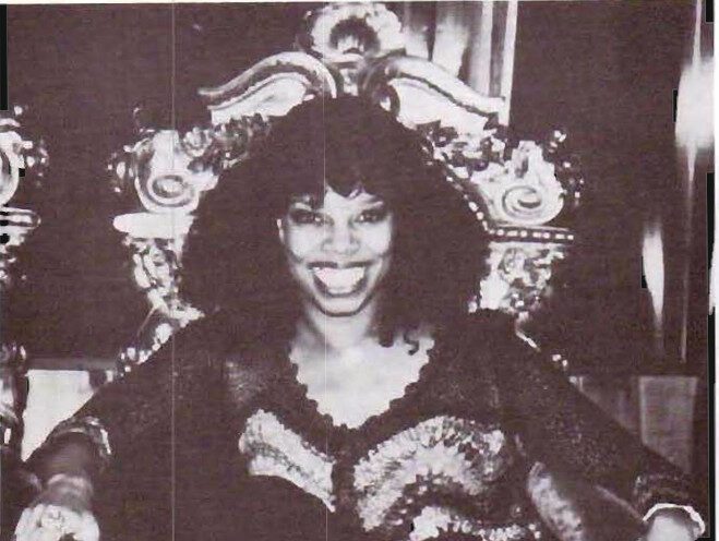 Mildred Virginia Jackson sitting on a throne