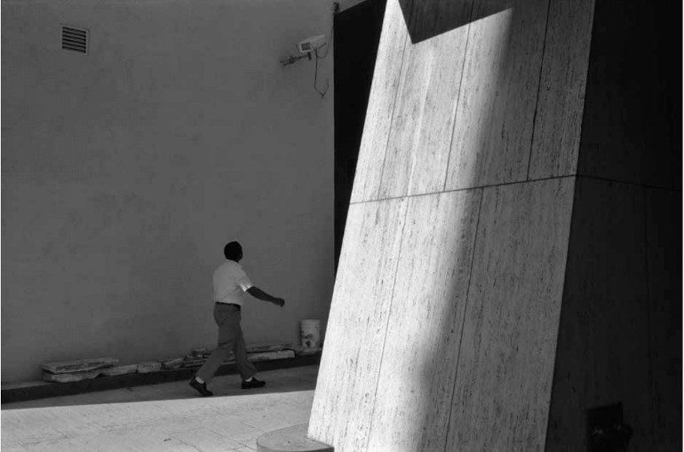 Dawoud Bey, A Man Walking Into a Parking Garage, 1981, silver gelatin print, 20 x 24 in.© Dawoud Bey. Courtesy Stephen Daiter Gallery.