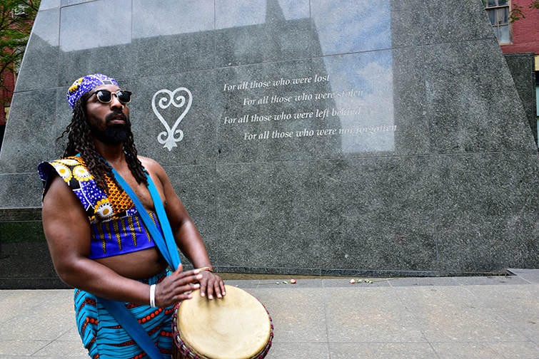 drummer the drummer is essential for the ritual as he plays the jimbe throughout the libation and ceremony for the ancestors. 