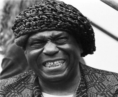 Sun Ra, aka Le Sony'r Ra with his signature head-piece, Photo by Val Wilmer