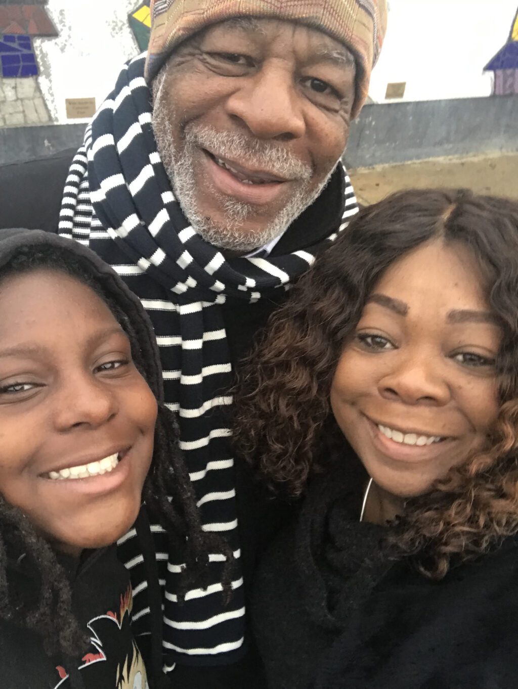 Ronn Bunn (C) with granddaughter Pharah and daughter Rona