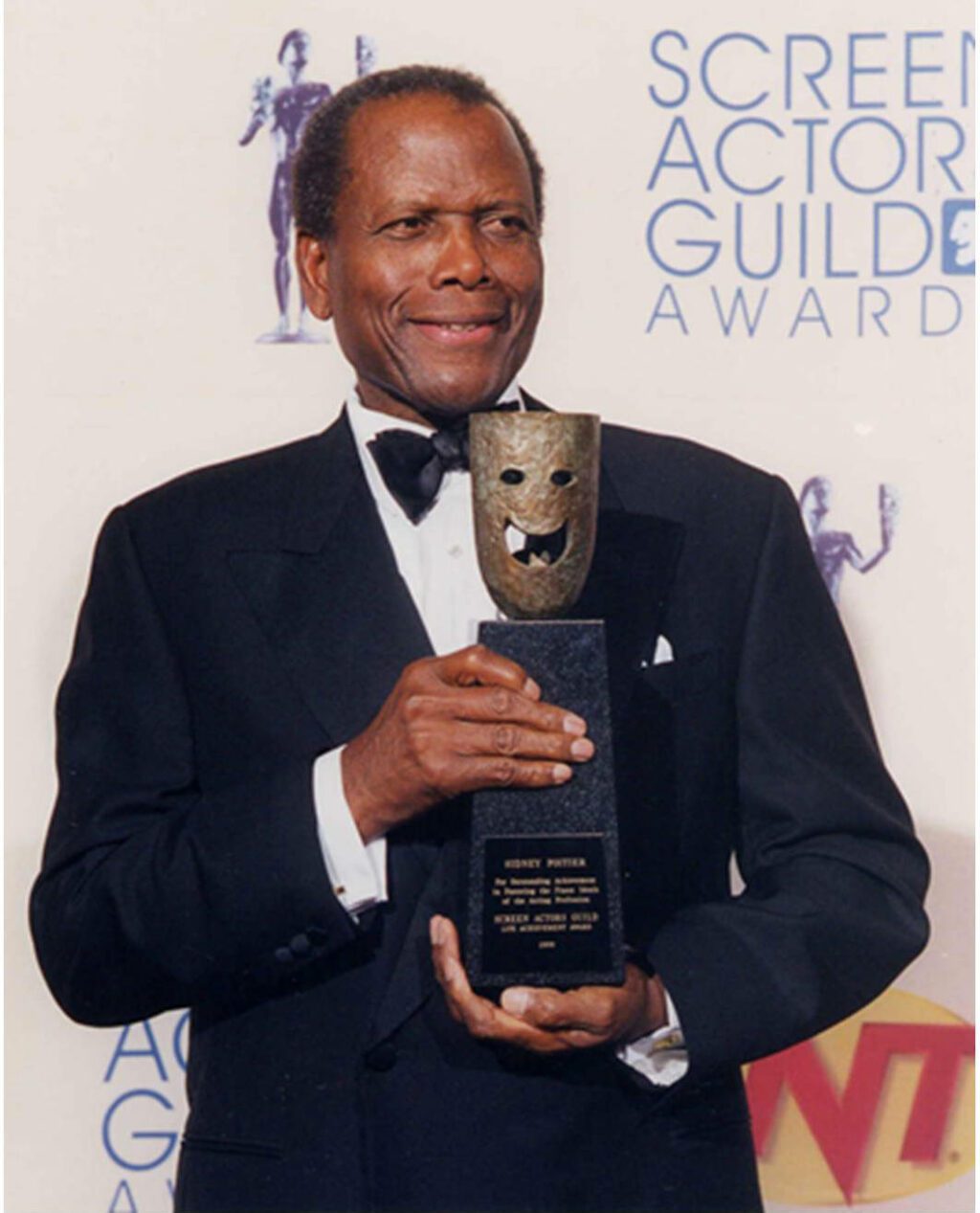 Sidney Poitier accepting a Screen Actors Guild award.