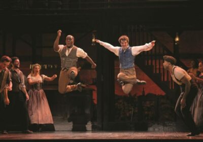 "Paradise Square" and New Perspectives on Tap Dance. Sidney DuPont as Washington Henry, A.J. Shively as Owen Duignanand ensemble in Paradise Square.