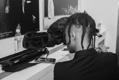 Backstage some of the musicians were preparing for their Carnegie Hall debut.