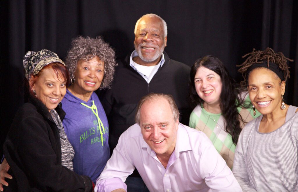 Publisher Ronn Bunn (Top, center) with his editorial staff from left to right, Lisa DuBois, Dr. Theda Palmer Saxton, Jeff Oppenheim, Ellen Levitt, Perri Gaffney