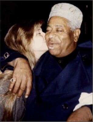 Ivan Nagy Serenading Dizzy Gillespie at Oops! the Wrong Door. Nina Michelle kissing Dizzy Gillespie