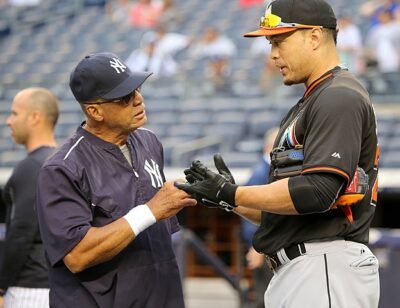 Reggie Jackson and Giancarlo_Stanton on Jun 18, 2015