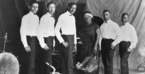 (Left to right, per Getty Image crediting): Ed Pollack, Albert Wynn, Thomas A. Dorsey, Ma Rainey, Dave Nelson, and Gabriel Washington in 1923 -- A Legacy of Inspiration — It's Called Gospel Music!